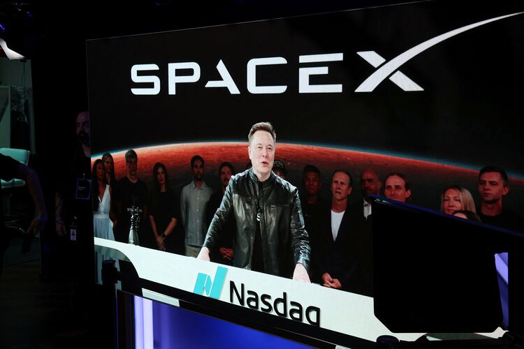 Elon Musk, speaks via videolink on the day of SpaceX's initial public offering (IPO) at the Nasdaq MarketSite in New York City, U.S., June 12, 2026.
