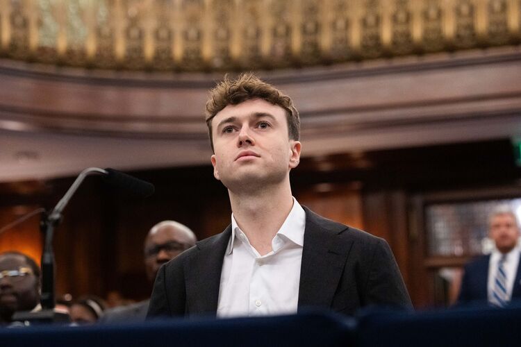 Jacob Coxon prepares to testify during a New York City Council Committee hearing on the risks and regulation of artificial intelligence at City Hall on October 5, 2026 in New York City. 