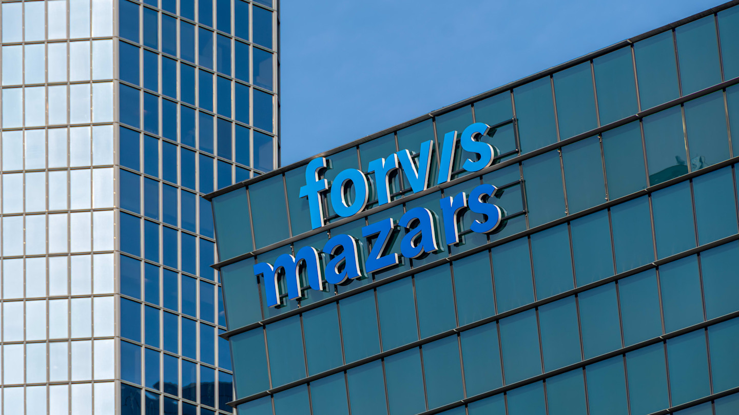 Forvis Mazars signage on a glass building