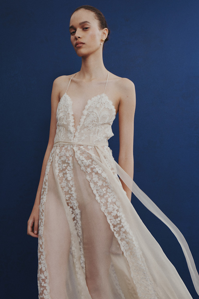 Fendi silk dress, £4,900, and silk briefs (just seen), £810. Chloé brass and resin pearl Tulip earrings, £290