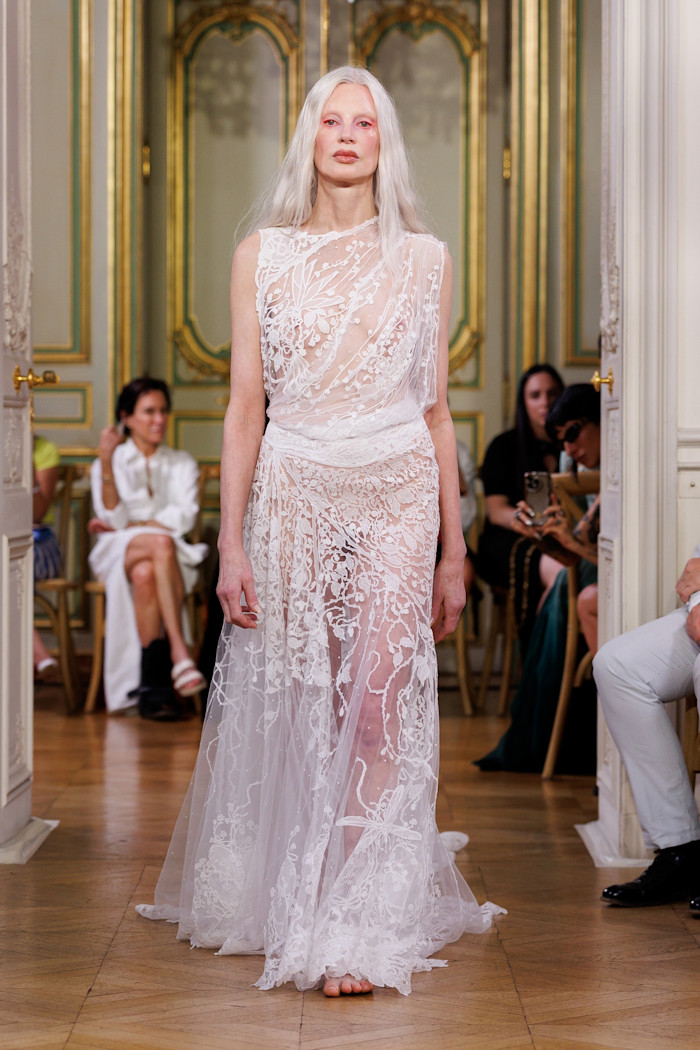Kristen McMenamy in an appliqué lace gown at Standing Ground’s AW 2026 couture show