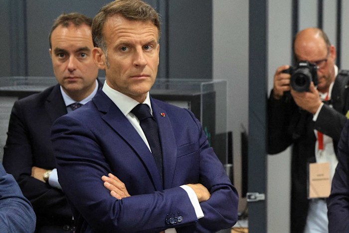 Emmanuel Macron with Sébastien Lecornu standing nearby.