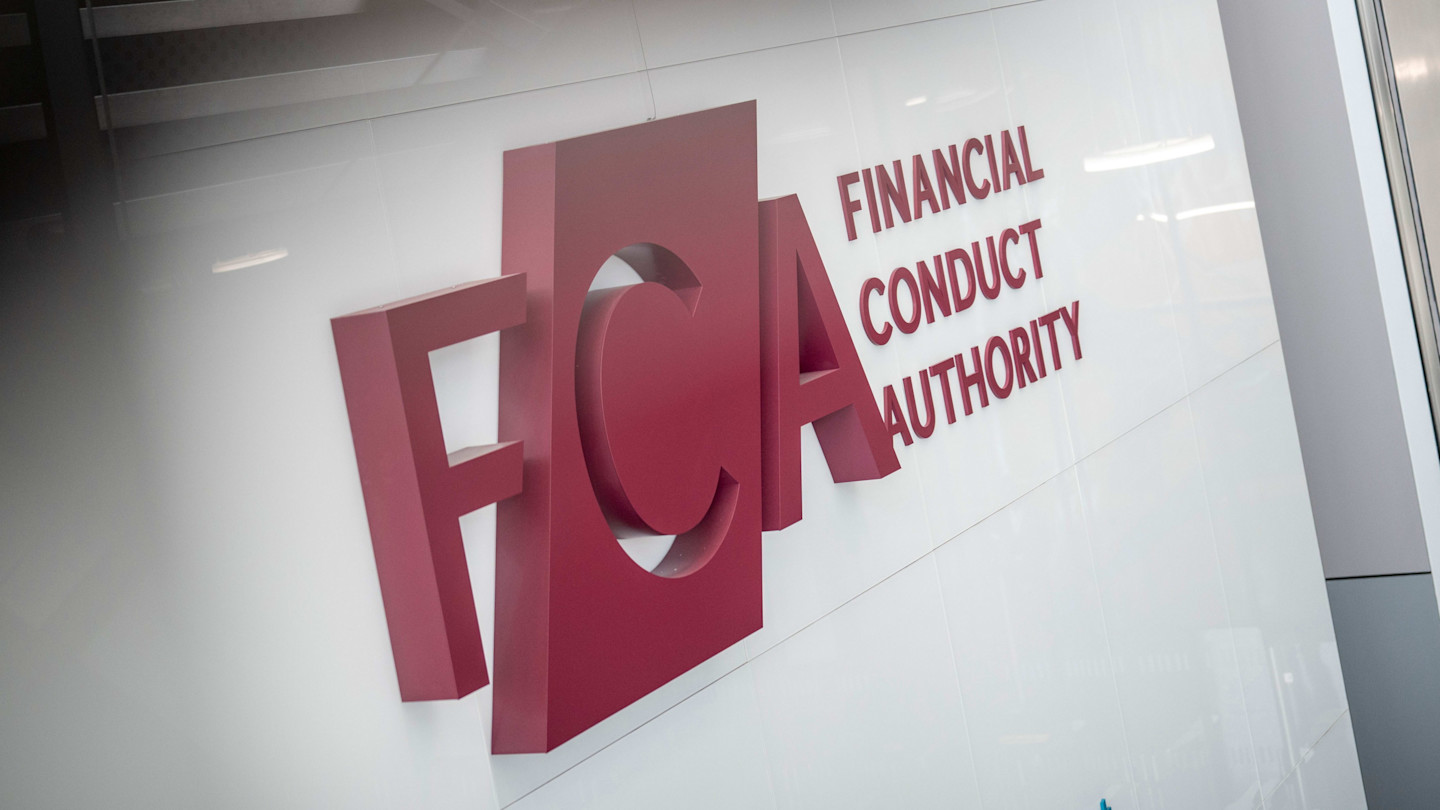 FCA logo and the words ‘Financial Conduct Authority’ displayed on a white wall at the organisation’s headquarters.