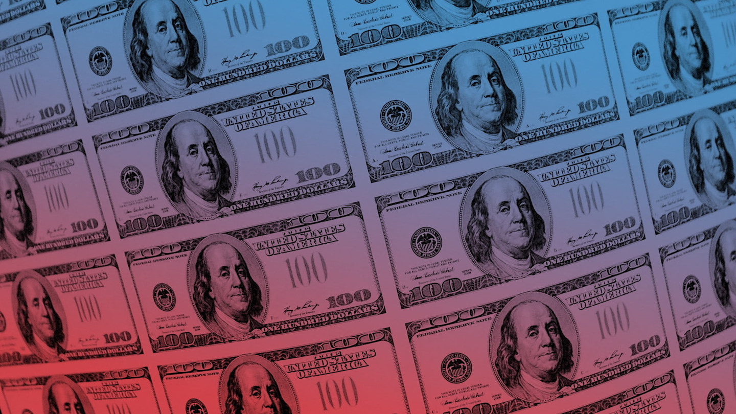 Multiple US $100 bills arranged in a grid pattern, with a gradient overlay of blue and red tones.