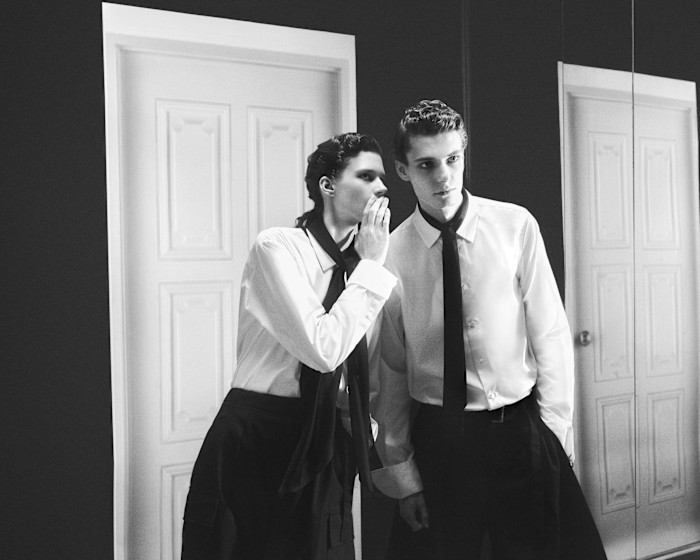 Murray wears Sacai cotton poplin shirt with satin scarf, £610, and wool-mix trousers, £890. Waldemar wears Sacai cotton poplin shirt with satin tie, £610, and wool flannel trousers, £1,220