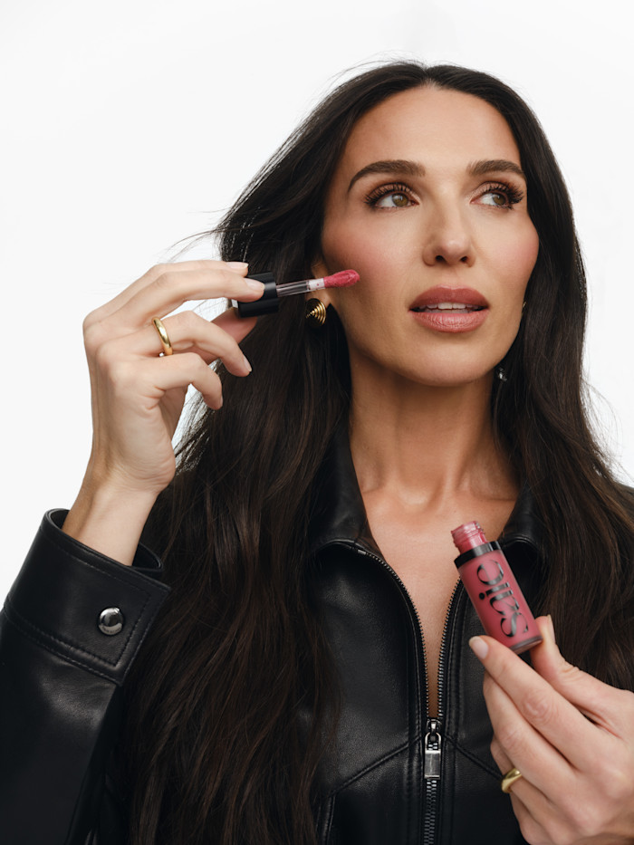 Laney Crowell, founder of Saie, models its dew blush 