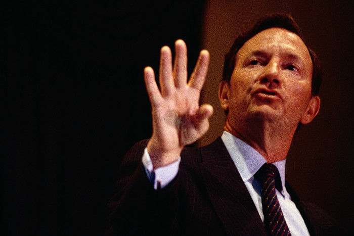 John Meriwether gestures with his hand while speaking at the Tomorrows Children's Fund Investment Research Conference.