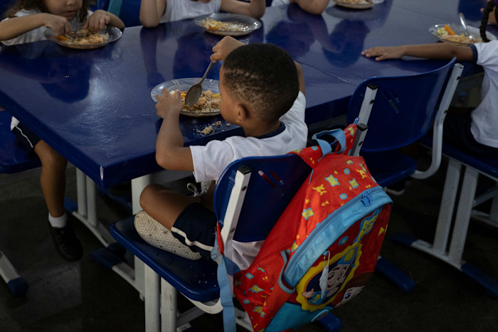 Students have lunch the municipal Burle Marx school’s kitchen in Rio de Janeiro, Brazil.