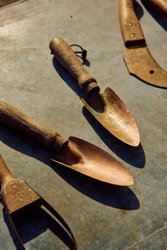 His copper hand tools, including two of his favourite trowels from Implementations