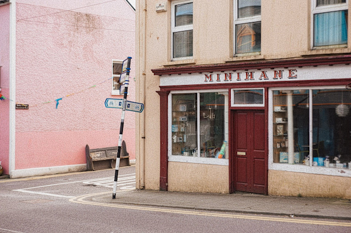 A shop called ‘Minihane’ on a town street corner.