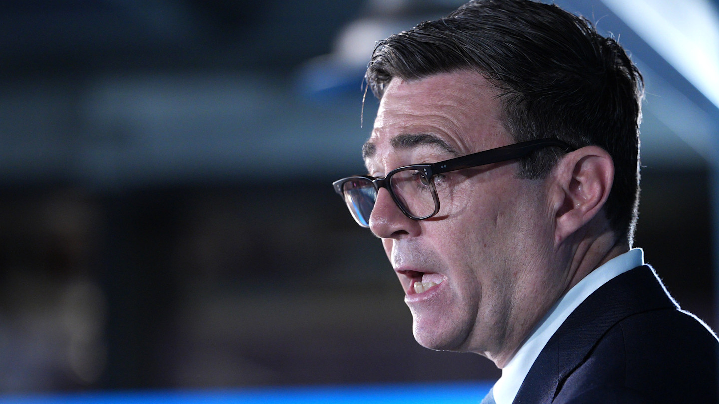 Andy Burnham speaks, shown in profile, during a speech at the Innovation Nation Summit.