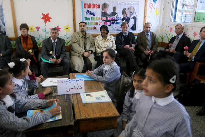 Pillay with other UN officials during a classroom visit to a school in Gaza City in 2011