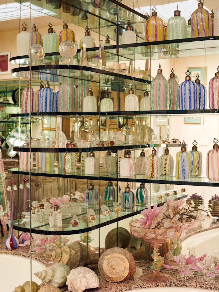 Raymond’s collection of antique Venetian cologne bottles