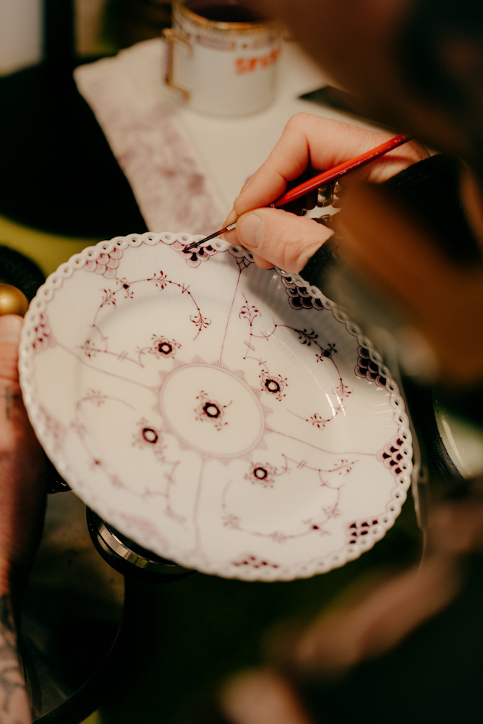 A Purpur Fluted Full Lace plate, £725, is painted