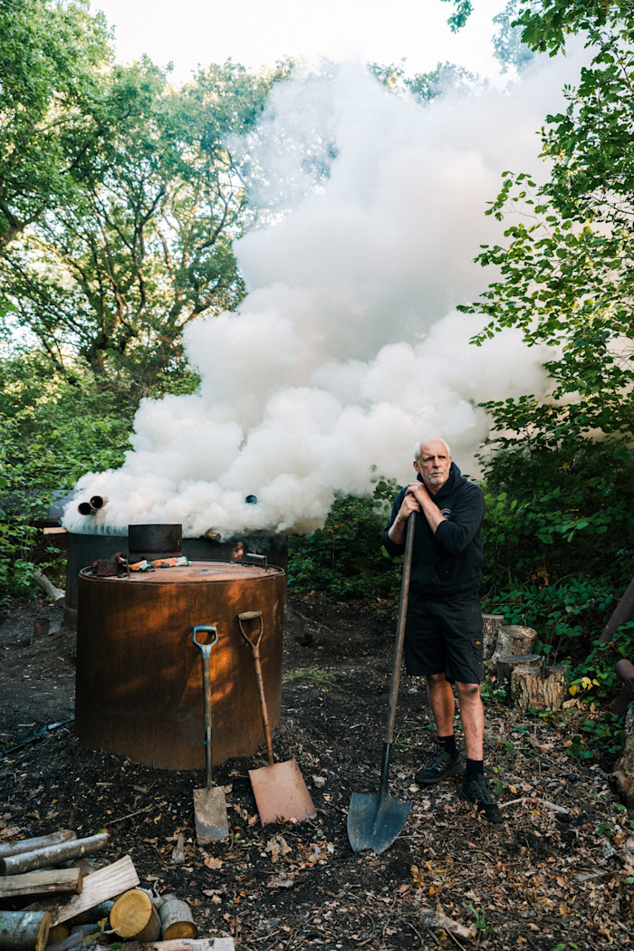 Jim Bettle with his charcoal kiln in Bonsley Woods
