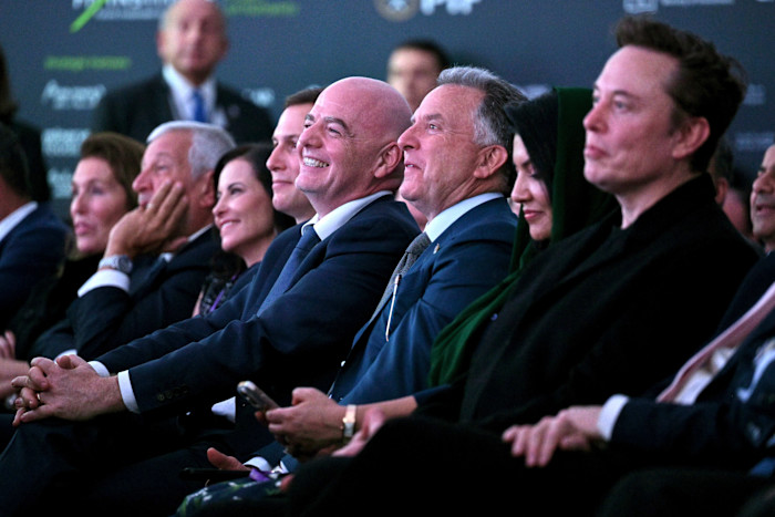 Elon Musk, Steve Witkoff, Gianni Infantino and Jared Kushner seated in the audience, listening attentively at the summit.