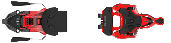 A pair of red and black ski bindings with adjustable metal components.