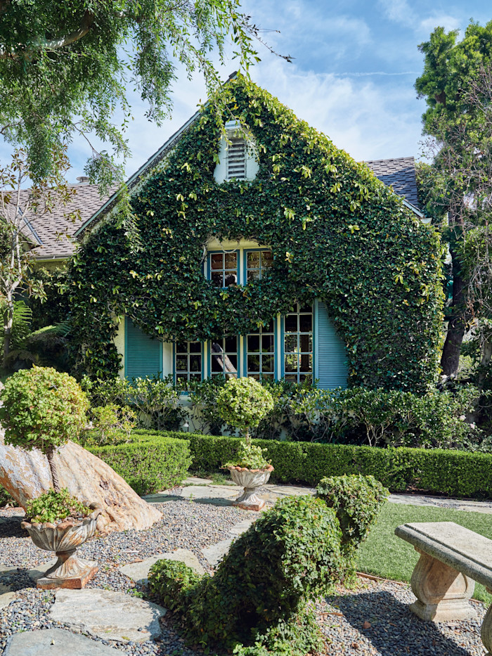 The ivy-covered façade of the late Harriet Raymond’s Beverly Hills home