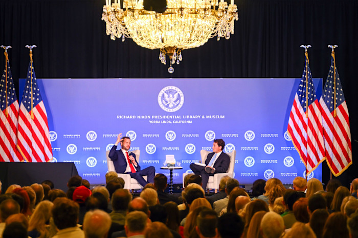 Vice-president JD Vance speaks with James Byron on stage before an audience at the Richard Nixon Presidential Library and Museum.