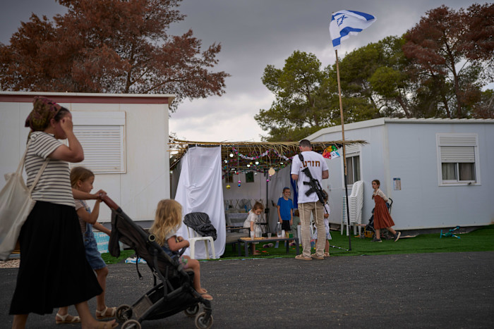 Israeli settlers gather as they celebrate the inauguration of the newly built illegal Kadim outpost in the occupied West Bank on September 30 2026