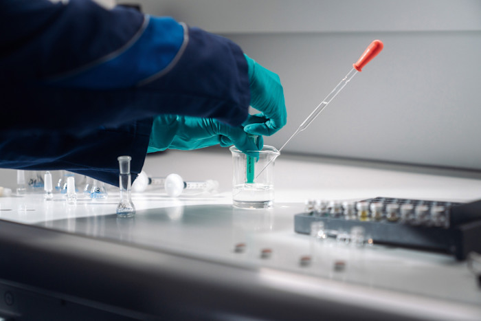 BMW Group Odour Lab team preparing samples from interior air sampling using chemical testing