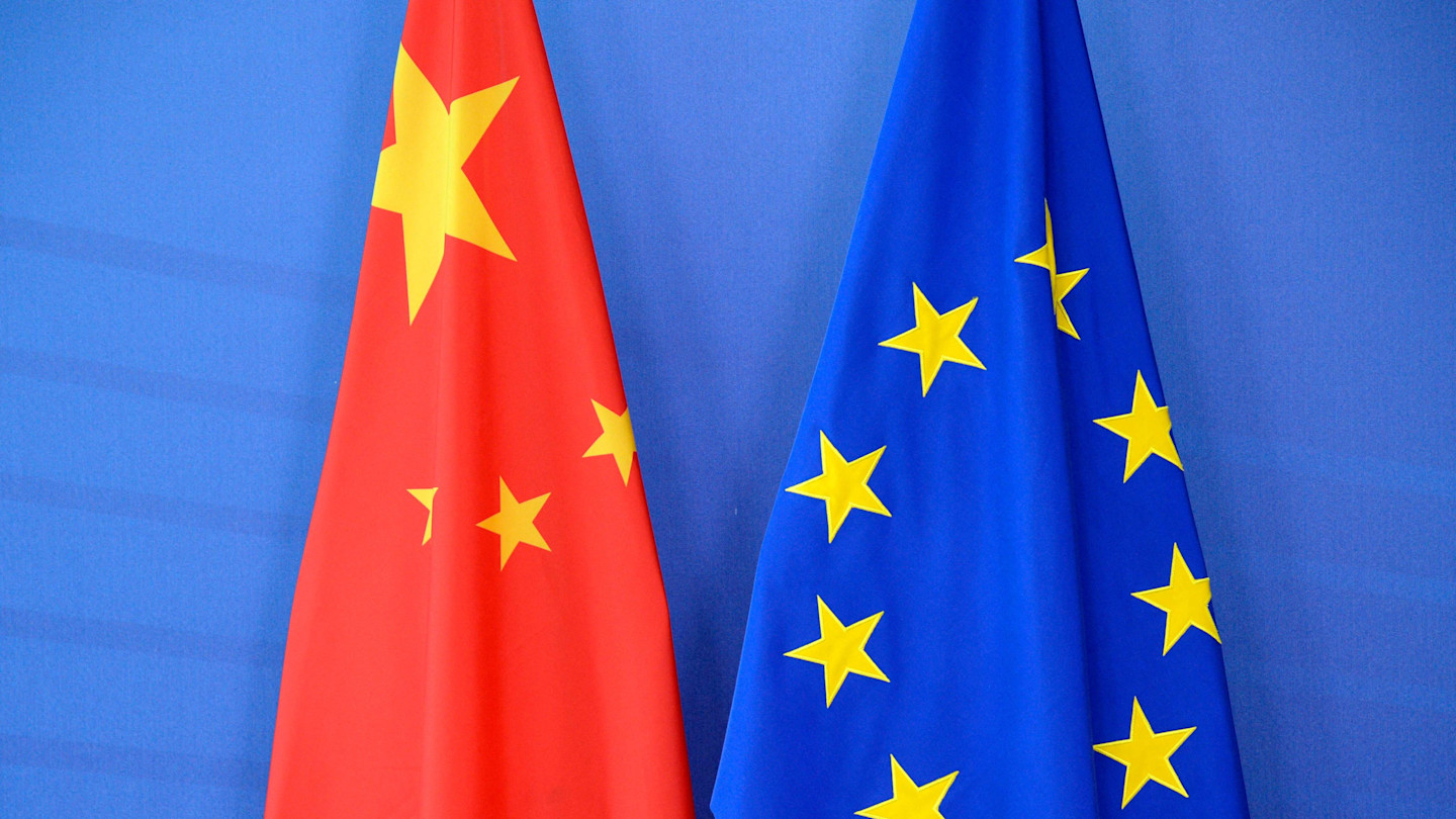 China's flag and the European Union flag displayed side by side at an EU-China Summit.