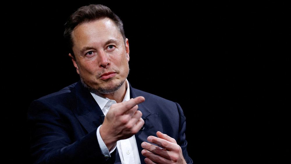 Elon Musk gestures while speaking at the Viva Technology conference in Paris.